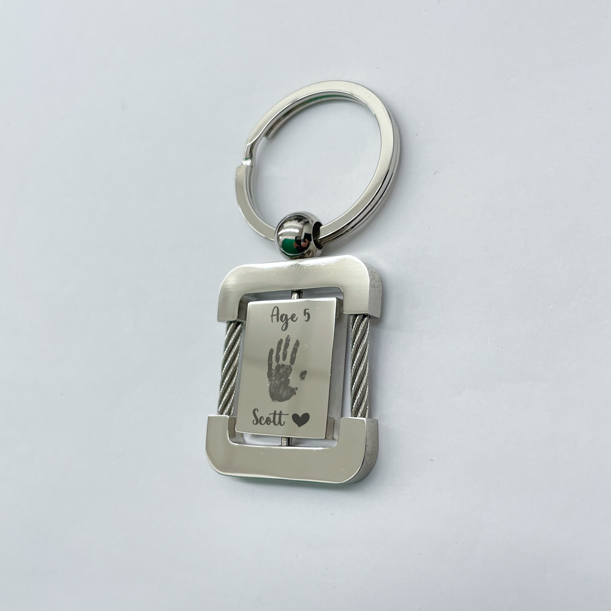 Double rotating square keychain CH 0103 – Kaashusa